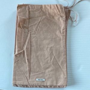Miu Miu shoe duster covers